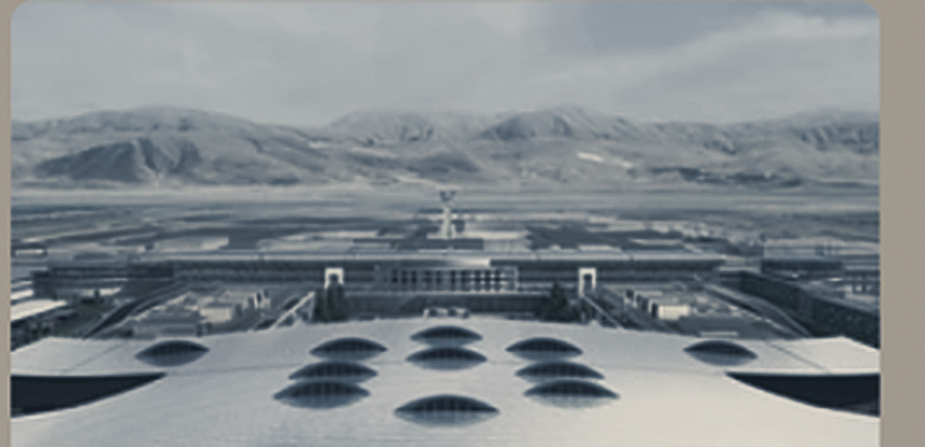 Vista aérea del terminal aeroportuario de Santiago con la cordillera al fondo